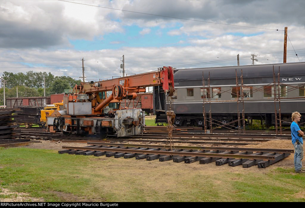 Amtrak Burro Crane Model 50 laying track